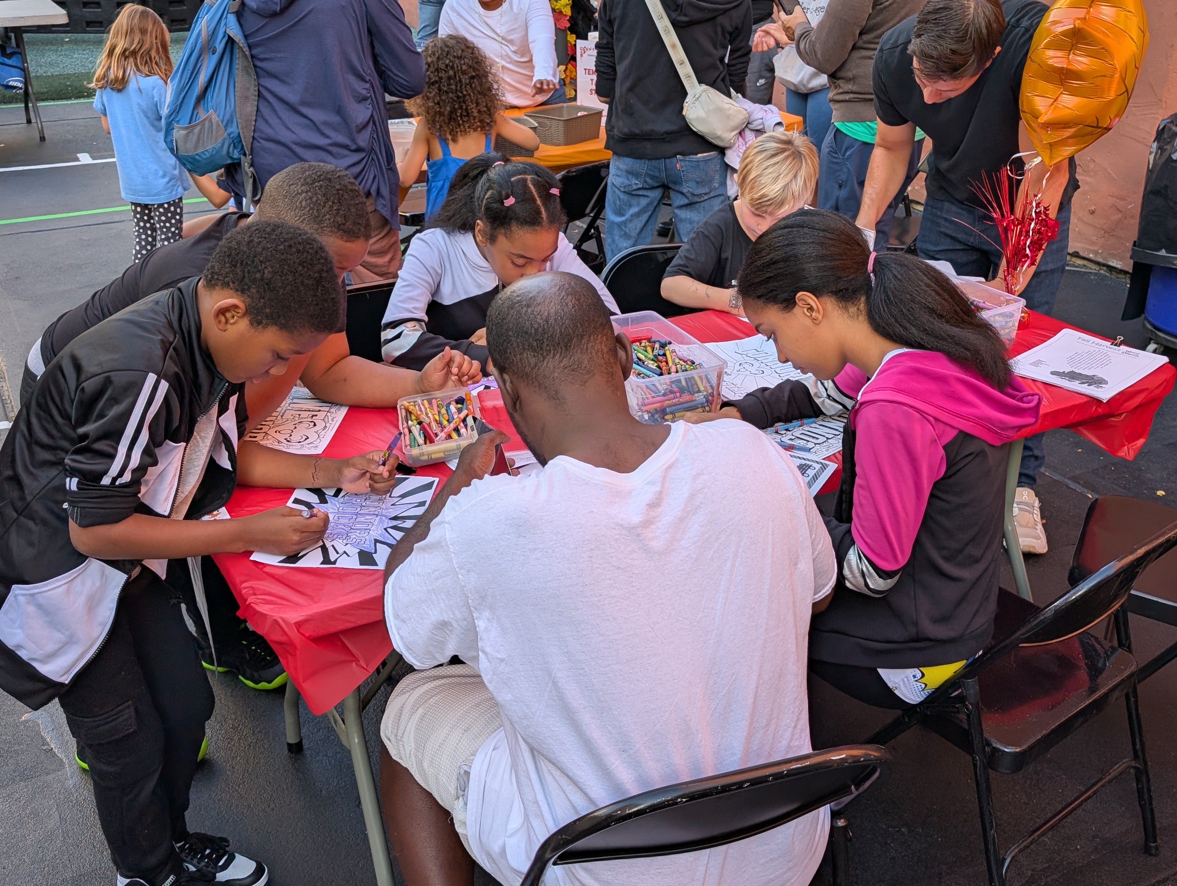 Families at the coloring station